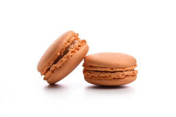 Orange macaroons isolated on white