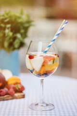Top view of summer dinks, fruit cocktails on white wood table wi