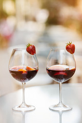 Top view of summer dinks, fruit cocktails on white wood table wi