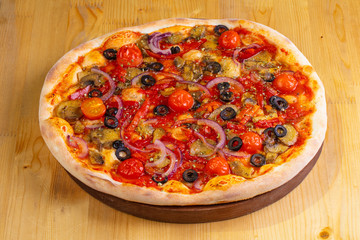 Pizza with mushrooms and tomatoes