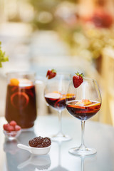 Top view of summer dinks, fruit cocktails on white wood table wi
