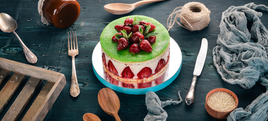 Strawberry Cake. On a wooden background. Top view. Copy space.