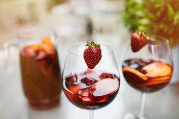 Top view of summer dinks, fruit cocktails on white wood table wi