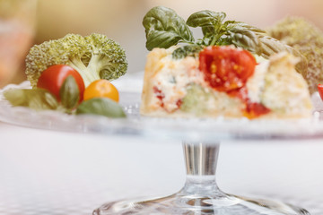 Delicious vegetarian pie and wine , Quiche with  tomatoes, brocc