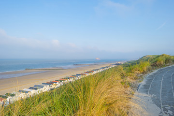 Fototapeta na wymiar Recreational beach along the North Sea viewed from a dune in spring