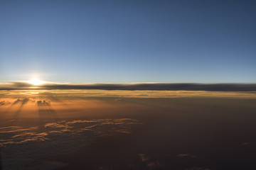 Fototapeta na wymiar Sunset in flight