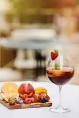 Top view of summer dinks, fruit cocktails on white wood table wi