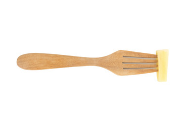 potato peel on fork isolated on white background