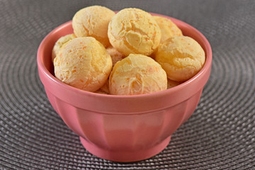 Cheese breads on gray texture background