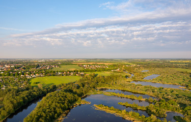 Fototapeta premium aerial view of the river warnow and lakes near rostock
