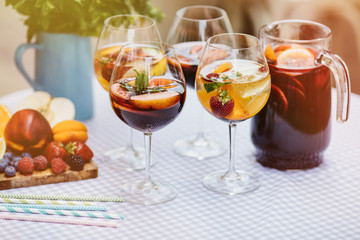 Top view of summer dinks, fruit cocktails on white wood table wi