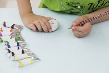 Handmade - little boy painting stone . activity for children