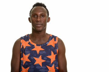 Young black African man wearing sleeveless shirt