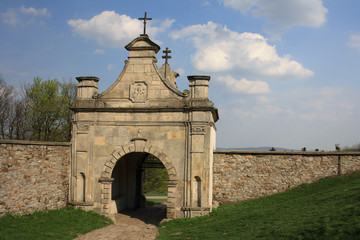 Fototapeta na wymiar Entrance gate to the monastery, Holy Cross, Świętokrzyskie Mountains