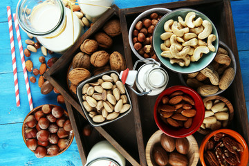Alternative types of milks. Vegan substitute dairy milk with nuts