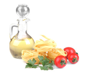 Pasta Fetuchini with several cherry tomatoes, olive oil and a bunch of parsley. Isolated