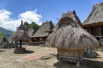 Megalithic stones and ceremonial strucutres in the middle of the Bena traditional village in Flores, Indonesia.