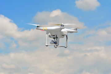 Modern drone flying outdoor, RF photo, no logos or trademarks