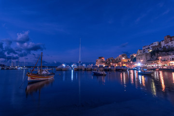 Fototapeta na wymiar Marina di Castellammare del Golfo al calar della sera, Sicilia