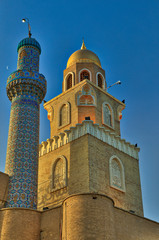 Obraz premium Two joint situated minarets of different eras at The Great Mosque of Kufa