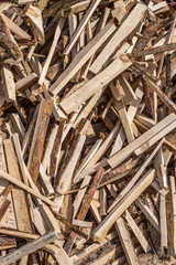 The background of wooden boards is chaotic in the pile.