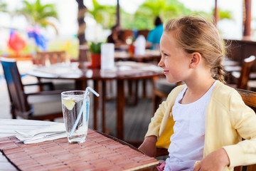 Little girl in restaurant