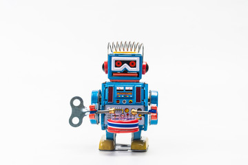 robot tin toy on white background