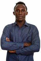 Young black African man with arms crossed