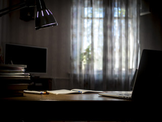 Obraz premium dark room working table with lamp