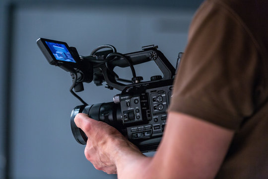 camera operator working with a cinema camera