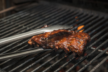 Caramelized Pork Ribs Being Prepared in Josper