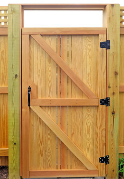 Architectural construction detail. New wood fence gate door.