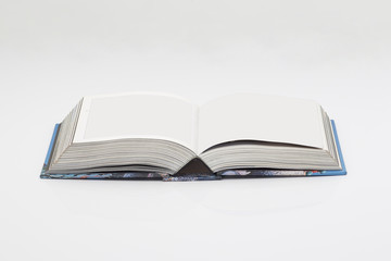 Opened book in a white background