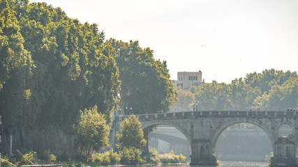 Bridge over the River Tiber on a misty day, Rome, Italy