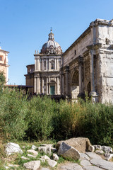 Arch of Septimius Severus and Curia Julia in the Roman Forum, Rome, Italy