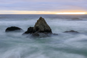 Stormy Sunset over Gray Whale Cove State Beach. Half Moon Bay, San Mateo County, California, USA.
