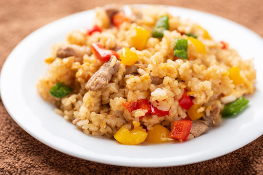 Fried rice with vegetables and pork, Asian cuisine
