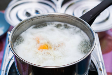 Beautiful Dessert boiled sweet egg in pot for Rainbow Thai Glutinous Rice Balls (Bui Loi Kai Whan)