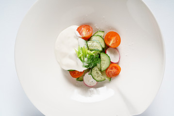 fresh salad with sour cream
