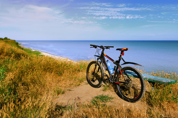 Fototapeta premium Mountain bicycle by the sea. Russia, Azov Sea, Taganrog Bay
