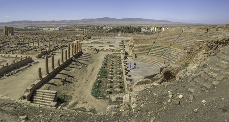 Panorama of Timgad, a Roman-Berber city in the Aures Mountains (Colonia Marciana Ulpia Traiana Thamugadi) with theatre in foreground, Algeria