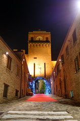 Night view of medieval Gradara castle near Pesaro city during the Christmas holidays, Marche, Italy.