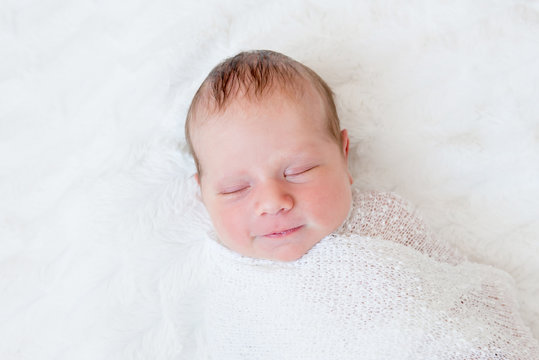 Close-up portrait of newborn baby