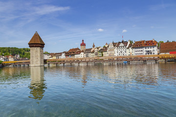 Fototapeta premium Chapel bridge famous place on lake Luzern with blue sky in Luzern, Switzerland, Europe.