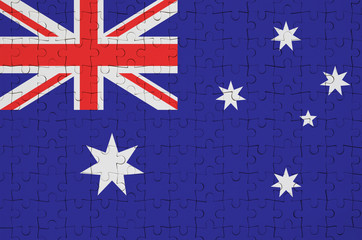 Australia flag  is depicted on a folded puzzle