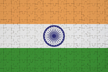 India flag  is depicted on a folded puzzle