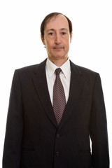 Studio shot of mature businessman