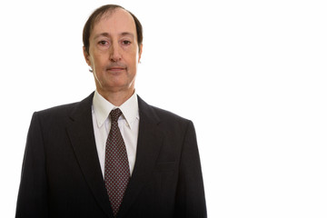 Studio shot of mature businessman