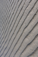 Obraz premium Sea sand clear surface with waves for background selective focus