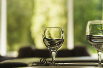 Empty glass standing on the table in the restaurant.